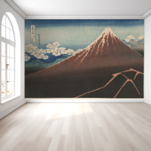 MHO-100 mockup Jitterbug's wallpaper mural of Katsushika Hokusai's block print, Shower Below the Summit (Sanka hakuu), hangs on the wall of a large room.