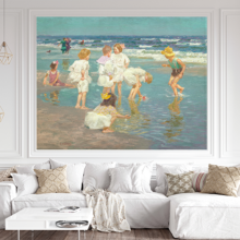 Jitterbug's wallpaper mural of Edward Henry Potthast's painting, A Holiday, hangs on the wall of a white living room.