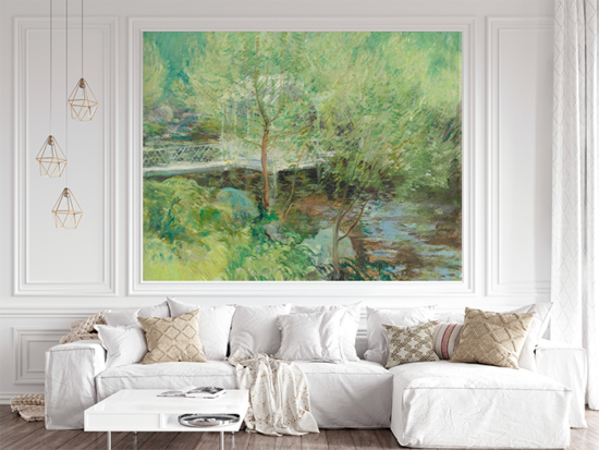 Jitterbug's wallpaper mural of John Henry Twachtman's painting, White Bridge, hangs on the wall of a white living area.