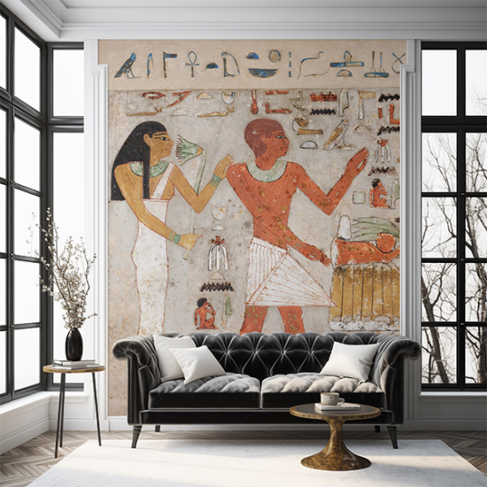 Jitterbug's wallpaper mural of the Ancient Egyptian relief, Stela of Amenemhat and Hemet, hangs on the wall of a modern living room.
