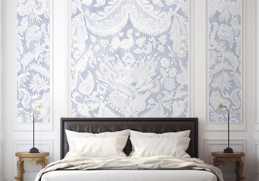 Jitterbug's wallpaper mural of 18th c. Cravat End Flemish lace hanging in a bedroom.