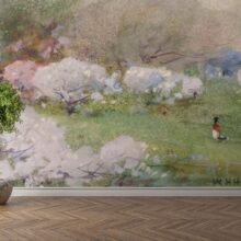 Jitterbug’s wallpaper mural of Cherry Blossoms by William Henry Holmes hangs on a wall.