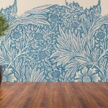 Jitterbug's wallpaper mural of William Morris' block print, Marigold, hangs on the wall.