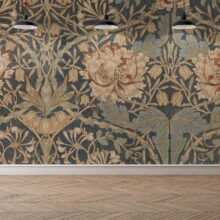 Jitterbug’s wallpaper mural of Honeysuckle by William Morris hangs on a wall.