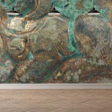 Jitterbug’s wallpaper mural of 10th c. Chinese bronze belt ornament hangs on a wall.