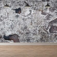 Jitterbug’s wallpaper mural of Medieval Armor 15th c. Italy hangs on a wall.