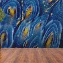 Jitterbug wallpaper mural of 1st c. BCE Mosaic Roman Glass hangs on a wall.