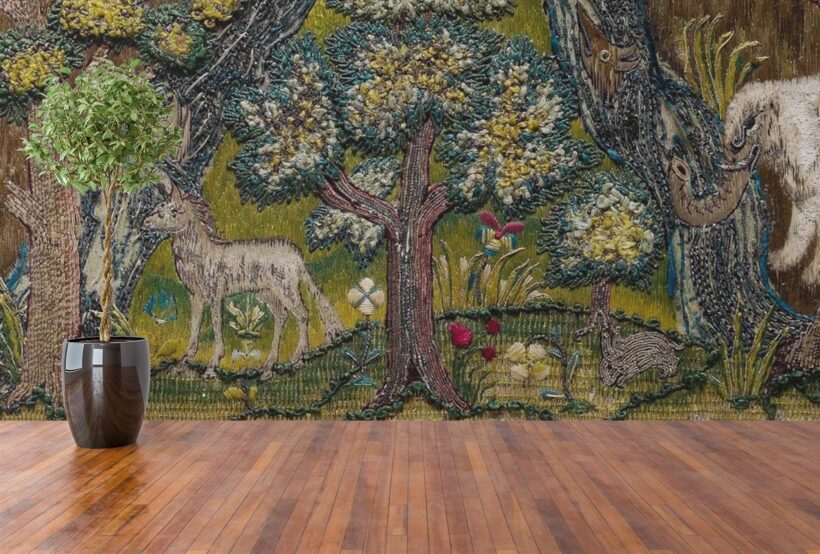 Jitterbug wallpaper mural of 1607 Bible Cover hangs on the wall.