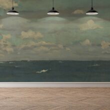 Sitting area with a white chair next to a window. Jitterbug's wallpaper mural of James McNeill Whistler's painting, Violet and Silver - The Deep Sea hangs on the wall.